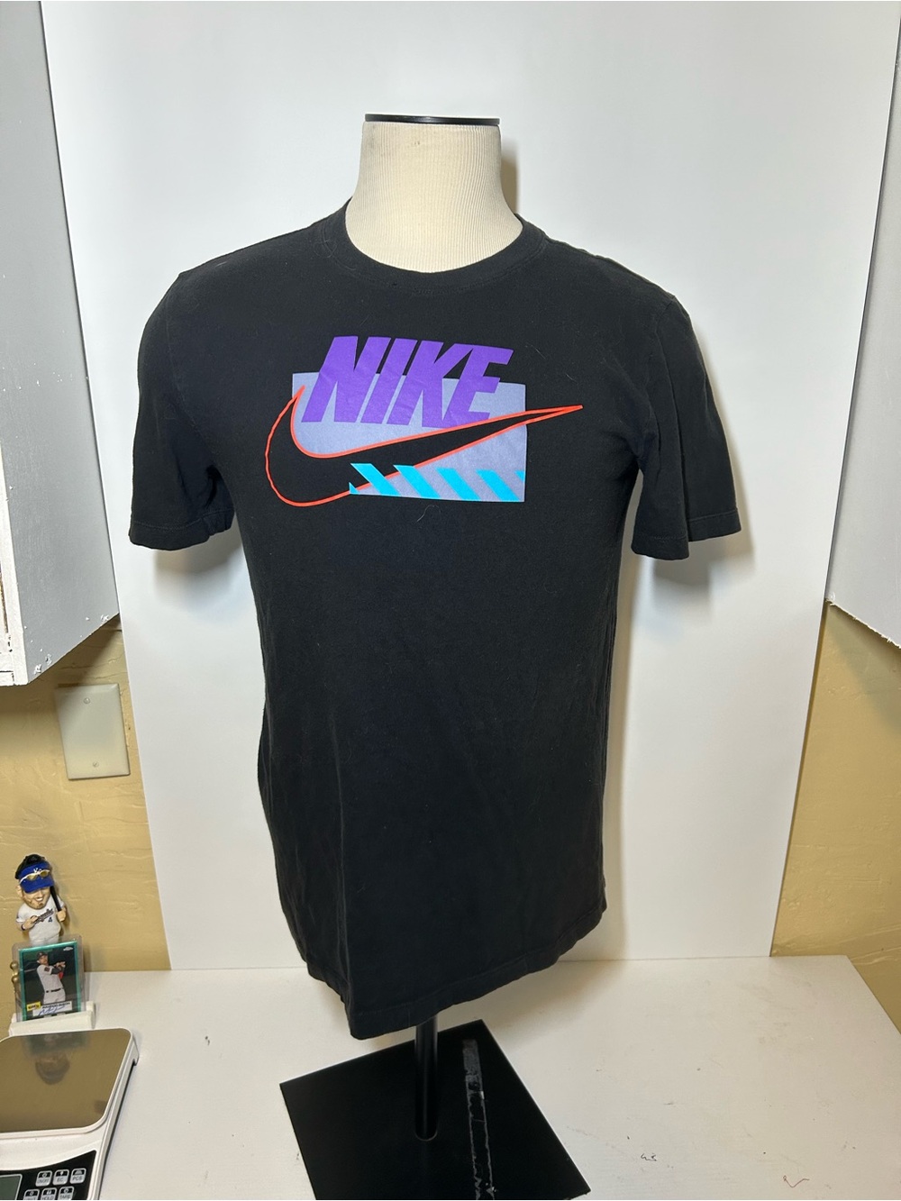 Nike Black Short Sleeve Tee with Purple Logo and Teal Accents